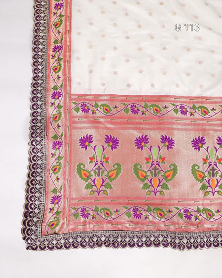 Decorative fabric with floral patterns and a border on a white background