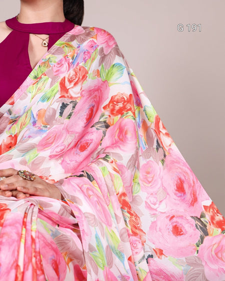 Floral saree with pink and multicolor design on a plain background