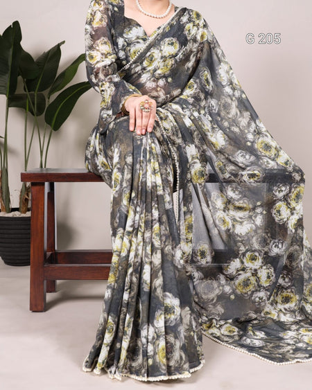 Floral patterned saree with a plain background