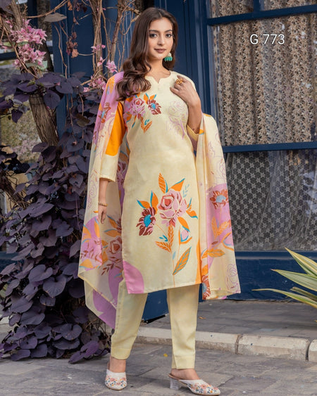 Woman wearing a floral dress with a colorful dupatta in an outdoor setting