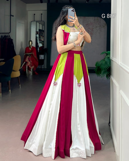 Woman wearing a colorful traditional outfit in a store setting