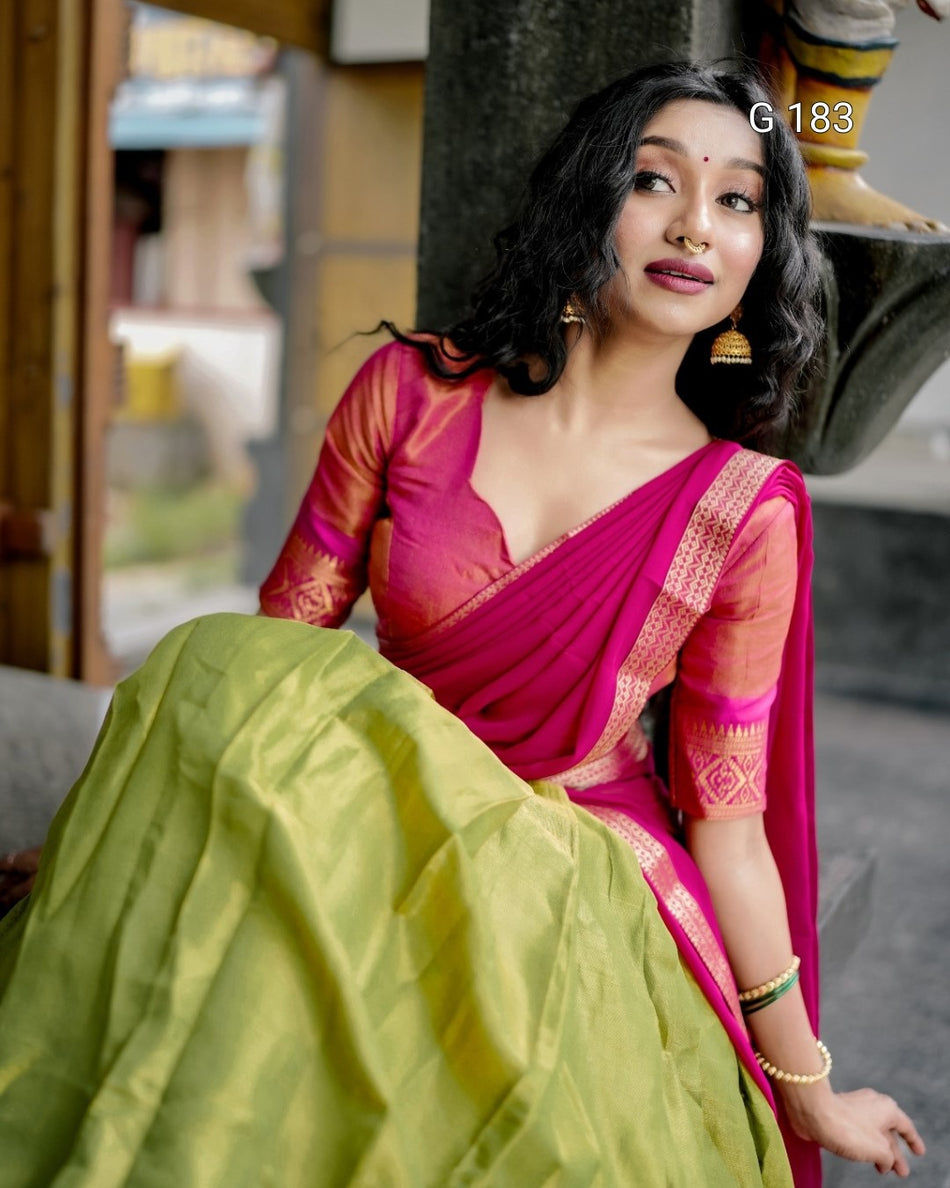 Woman in a pink saree with a blurred background