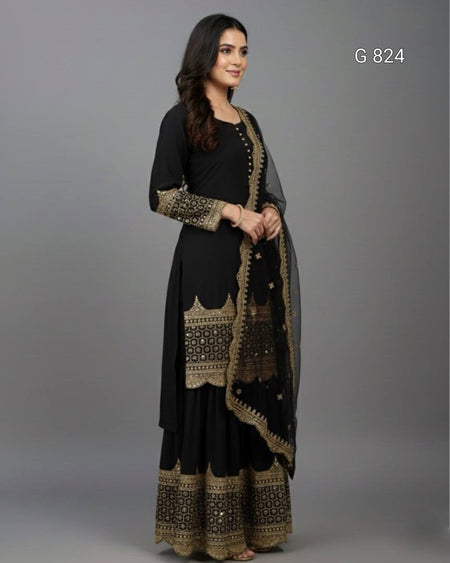 Woman wearing a black and gold traditional outfit on a gray background