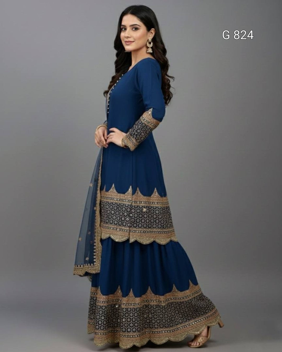 Woman wearing a blue and gold traditional outfit on a gray background