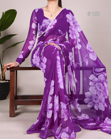 Purple floral saree with a plain background