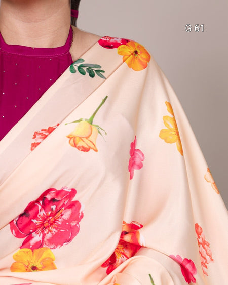 Floral patterned fabric with pink, orange, and green colors on a plain background