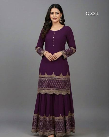 Woman wearing a purple dress with intricate patterns on a gray background
