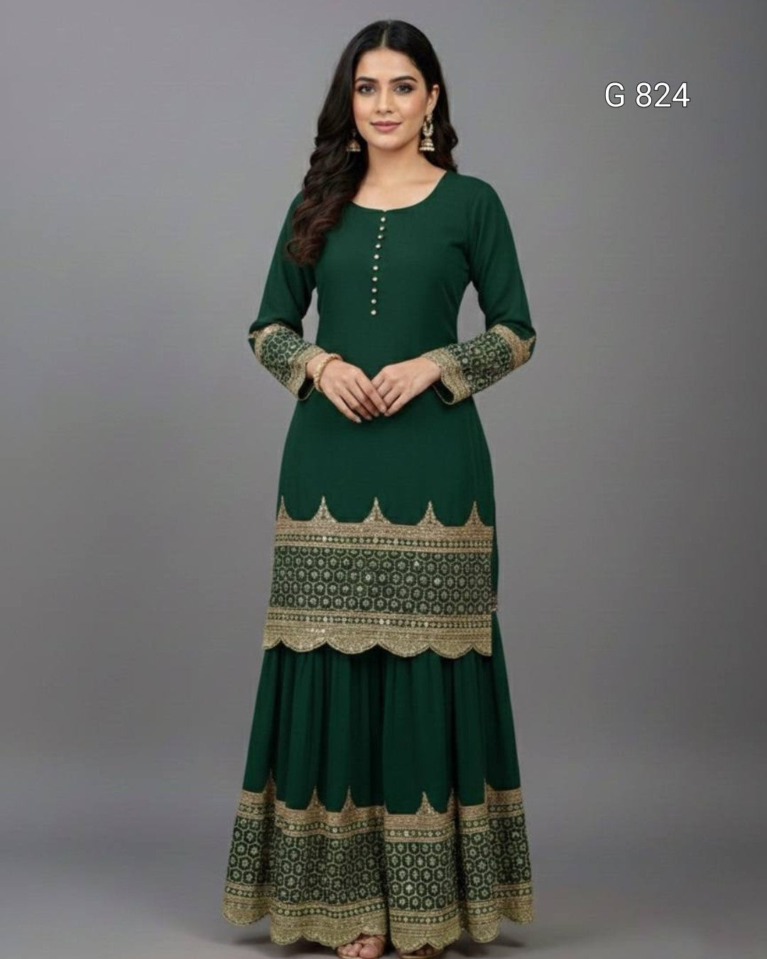 Green dress with patterned hem and sleeves on a gray background