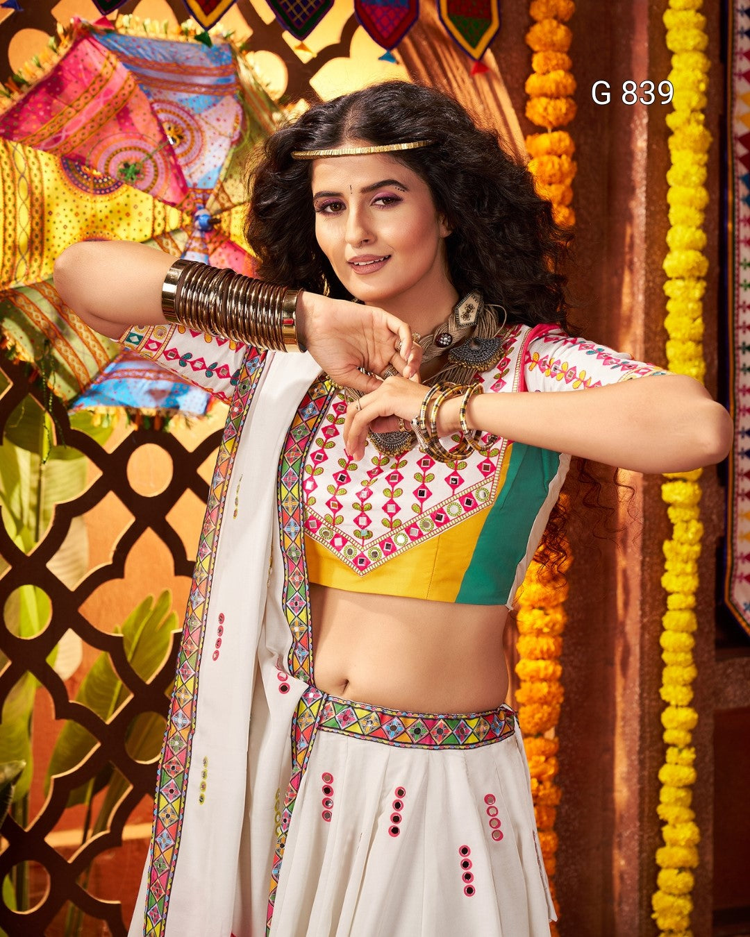 Woman in traditional attire with colorful background