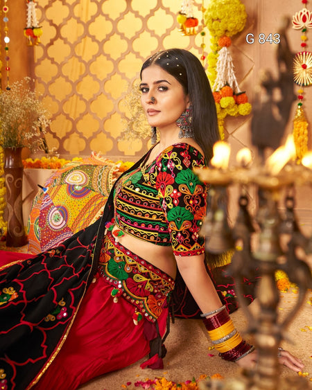 Woman in traditional colorful outfit with decorative background