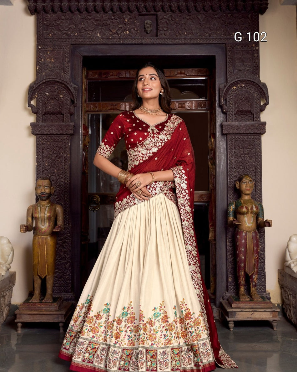 Woman in a red and white traditional outfit standing in a decorated room with statues.
