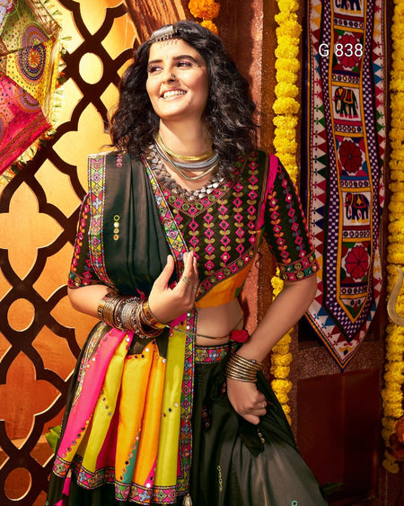 Woman in traditional attire with decorative background