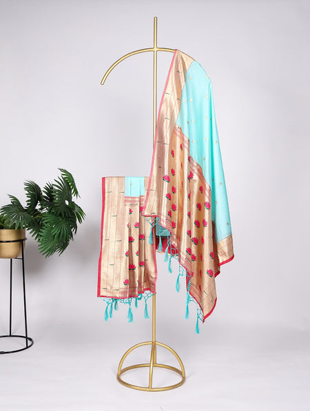 Colorful dupatta draped over a gold stand with a white background