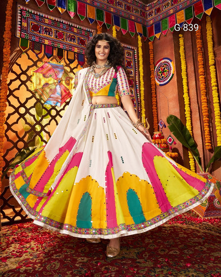 Woman in a colorful traditional outfit with a vibrant background