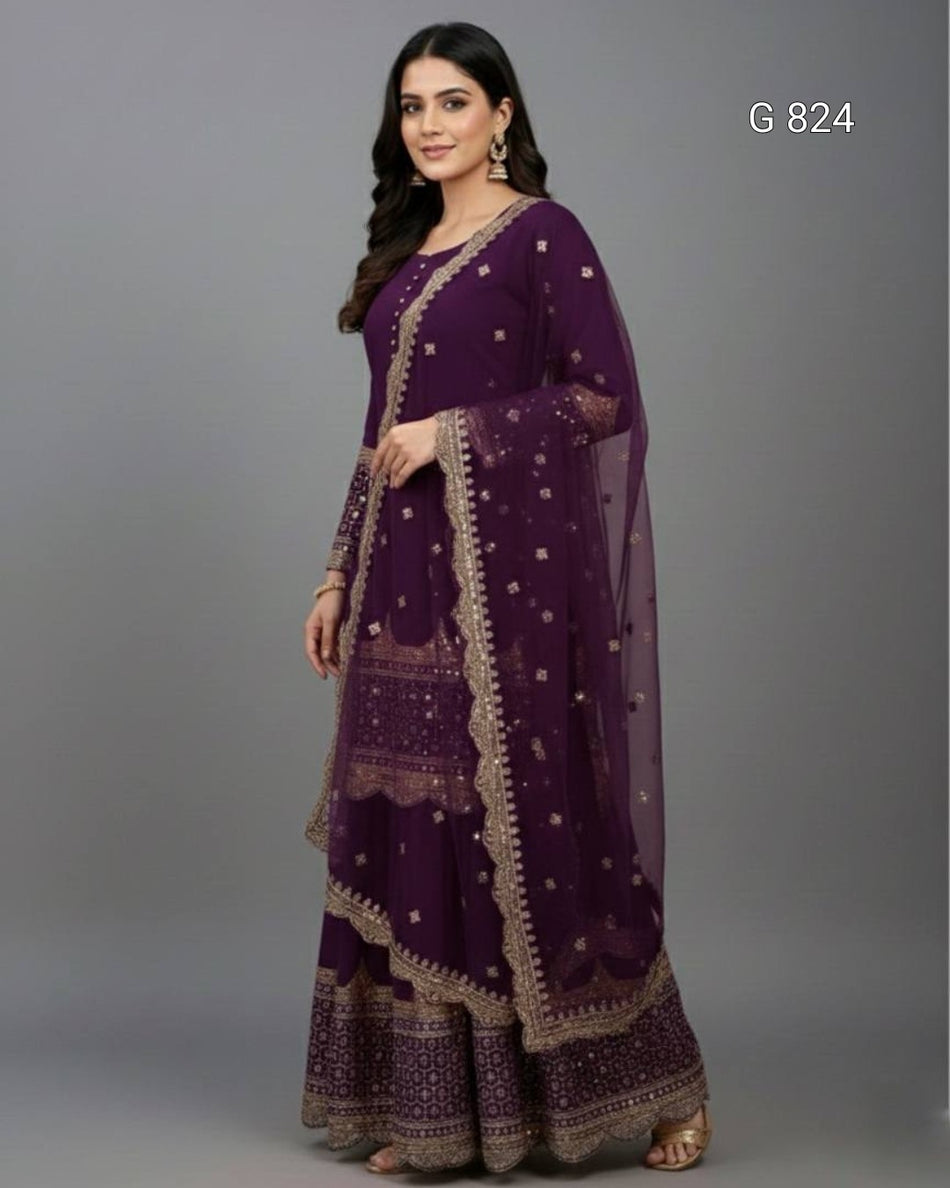 Woman wearing a purple traditional outfit with gold embroidery on a gray background